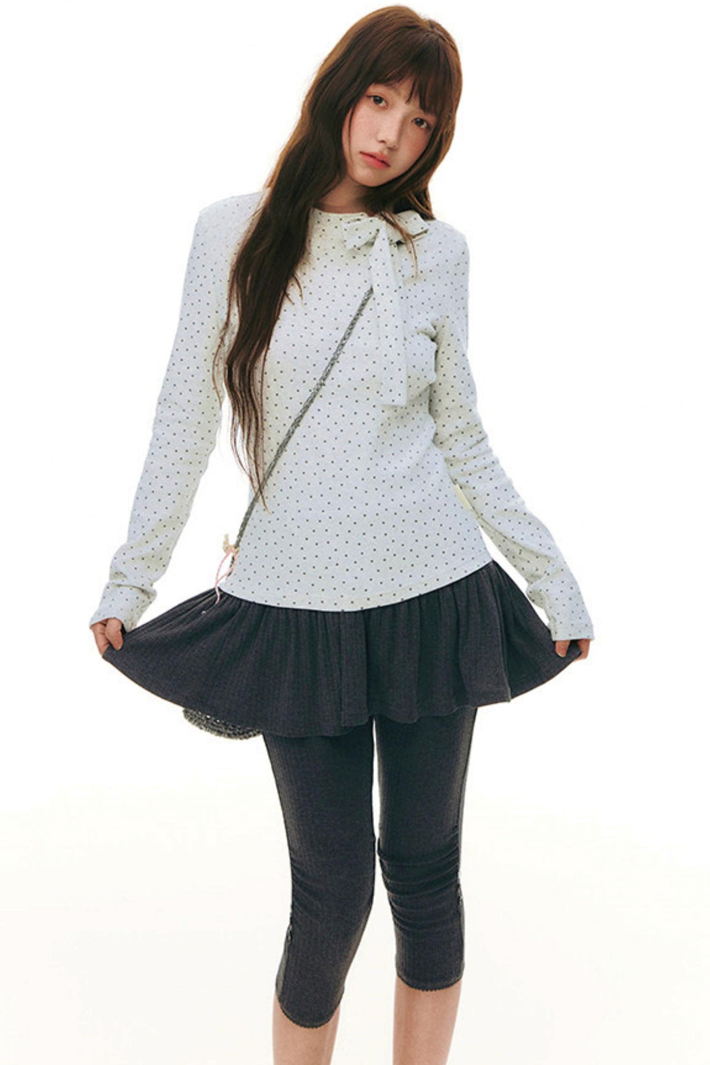 Top aderente con collo alto a stella