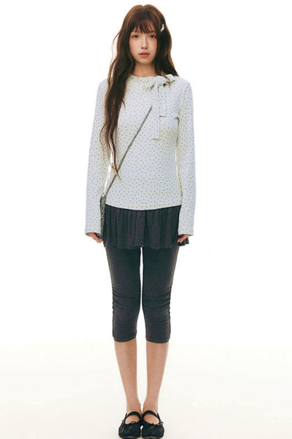 Top aderente con collo alto a stella