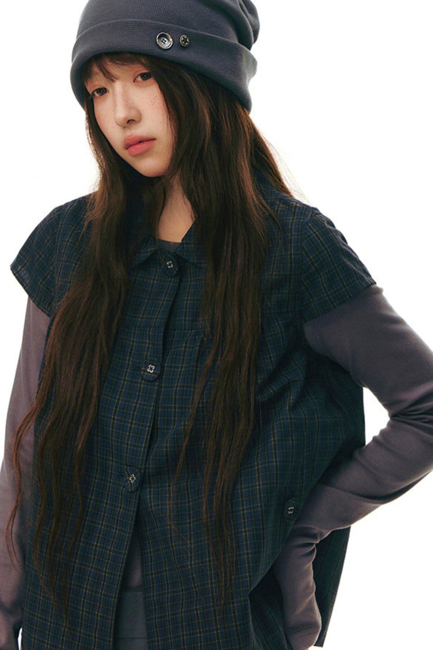 Top con colletto da bambola e maniche a volant