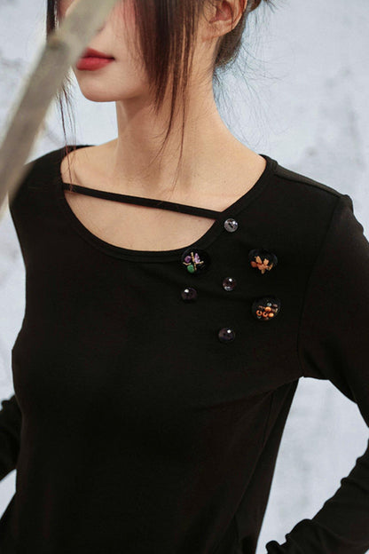 クリスタルボタンベルベットニットトップス