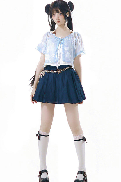 Completo marinaro in chiffon blu trasparente