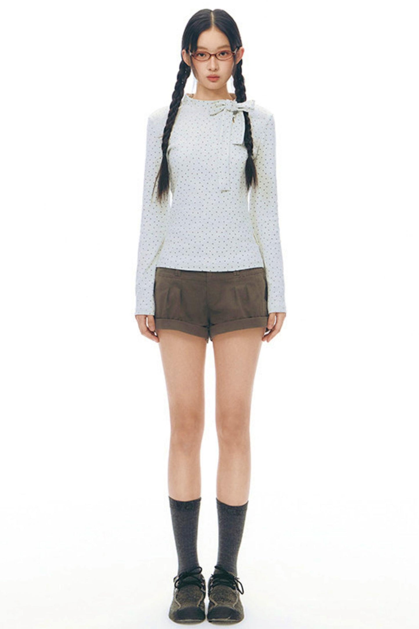 Top aderente con collo alto a stella