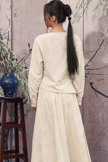 Ensemble élégant haut ample drapé en jacquard blanc cassé + jupe