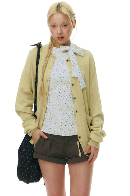 Top aderente con collo alto a stella