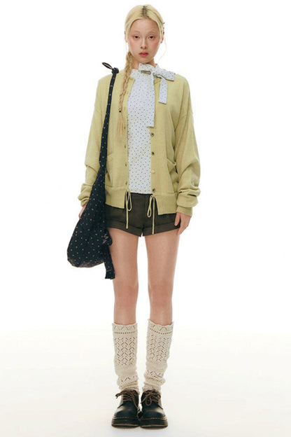 Top aderente con collo alto a stella