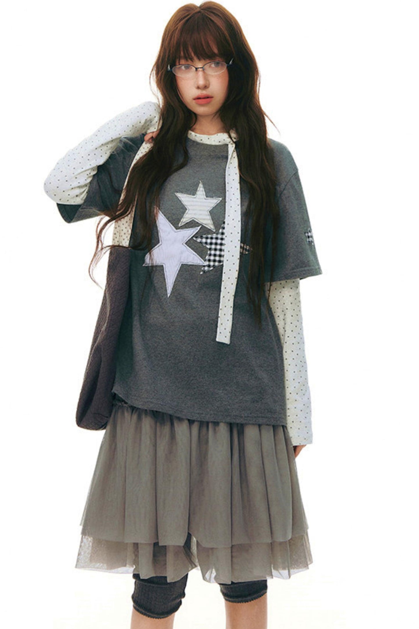 Top aderente con collo alto a stella