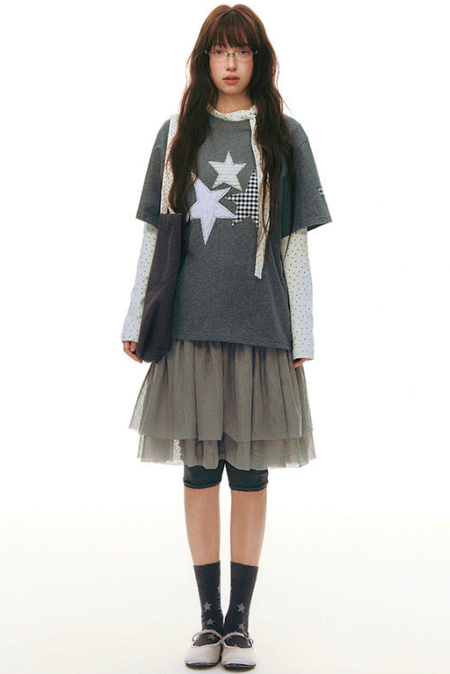 Top aderente con collo alto a stella