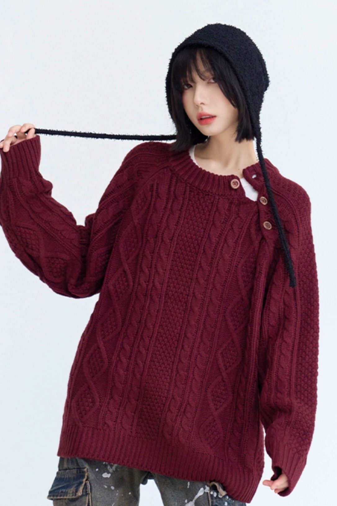 Twist design side button loose sweater