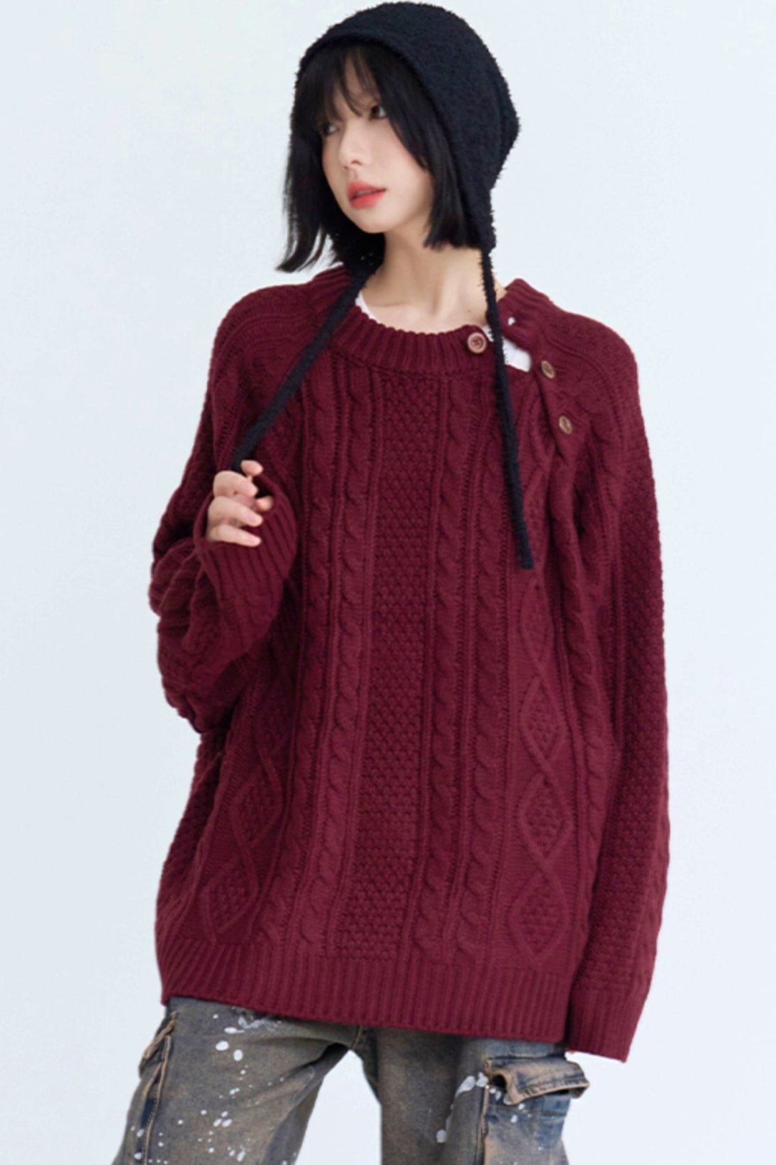 Twist design side button loose sweater