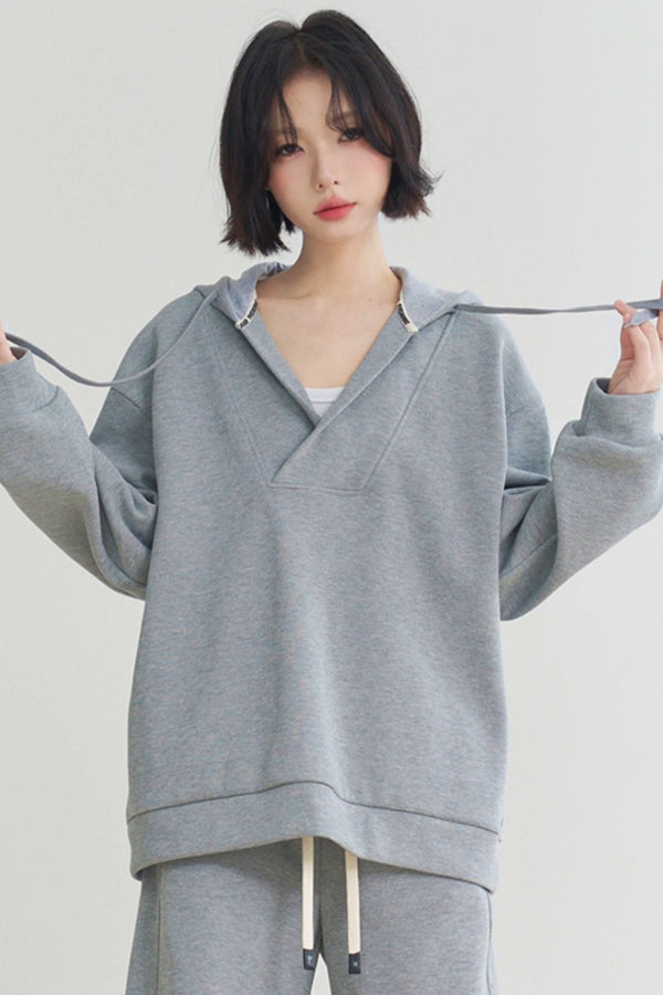 フーディッドスウェットシャツアンドカジュアルパンツセットアップ