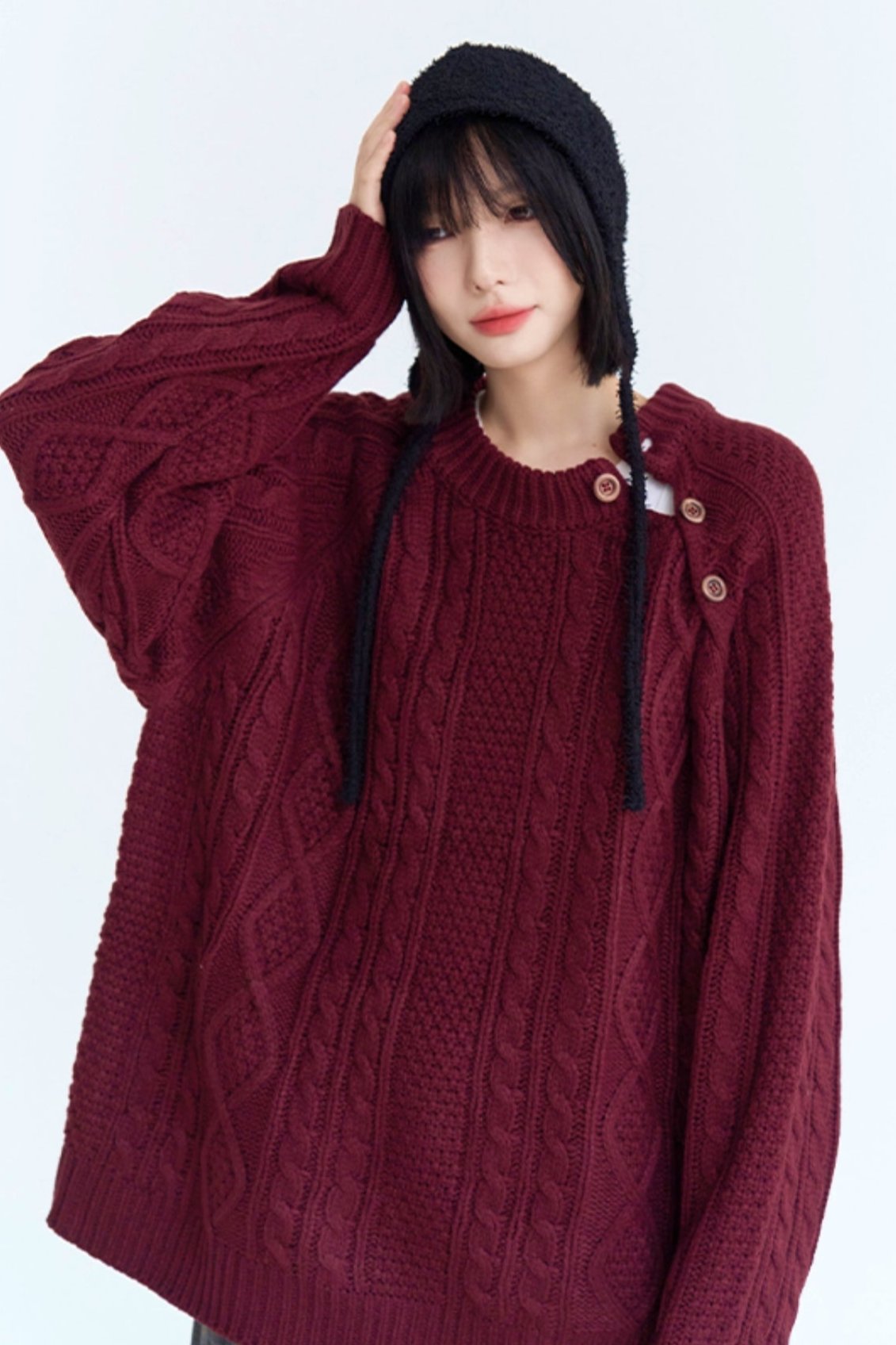 Twist design side button loose sweater