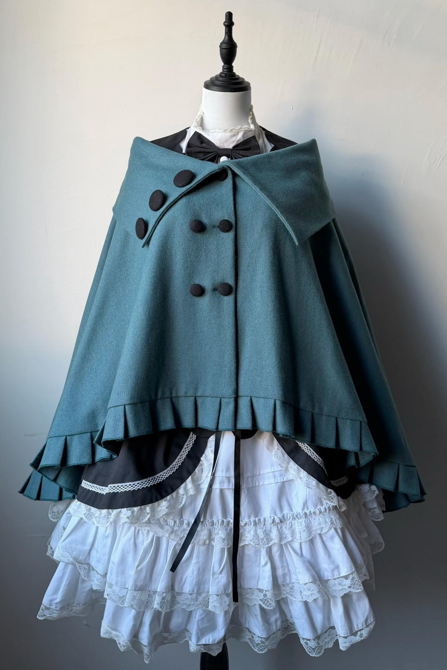 サブカルダブルボタンケープコート