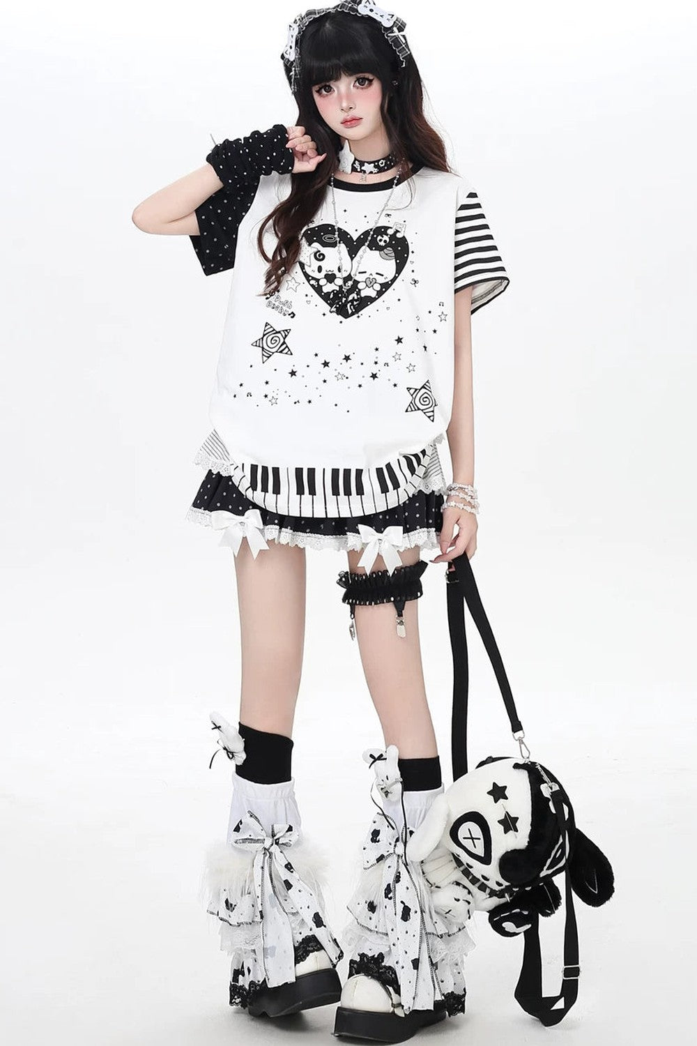 Camiseta holgada de rayas con gato y piano