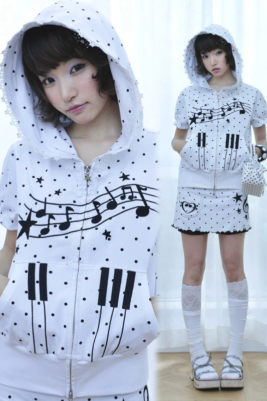 Sweat à capuche à pois avec notes de musique et clavier