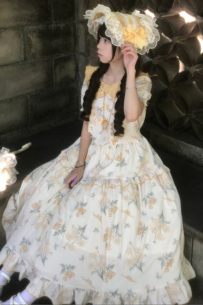Kleid mit pastoralem Blumenprint und Bubikragen