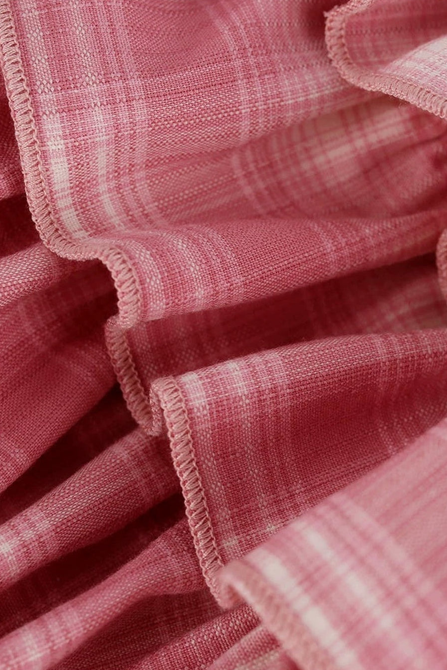 Rosa Oberteil im College-Stil + Stufenrock mit Schleife