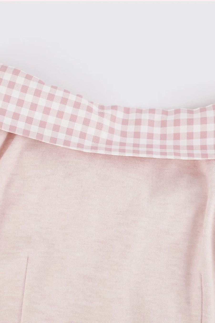 Top rosa femminile + gonna a balze a quadri