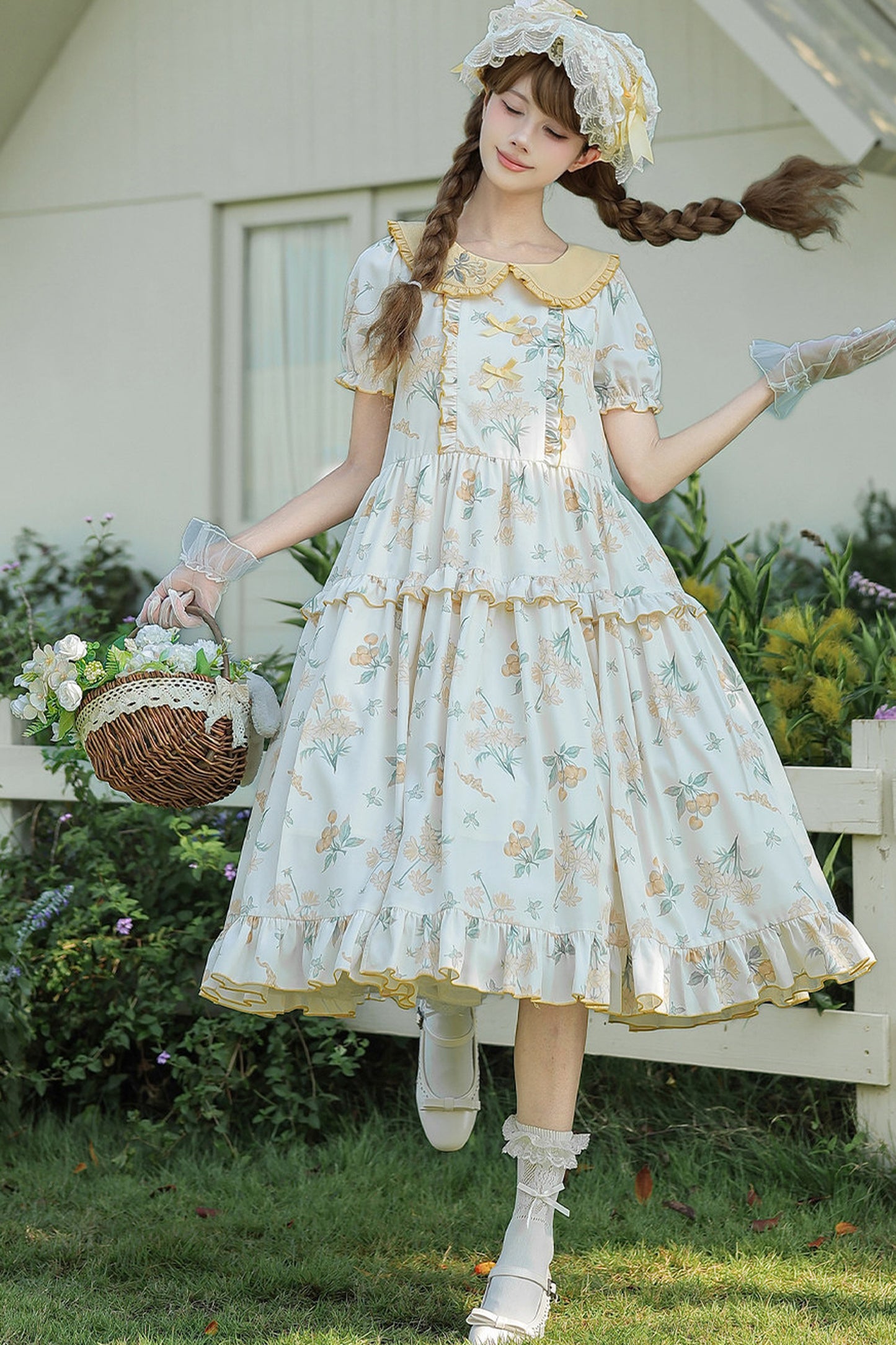 Kleid mit pastoralem Blumenprint und Bubikragen