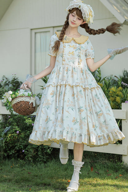 Kleid mit pastoralem Blumenprint und Bubikragen