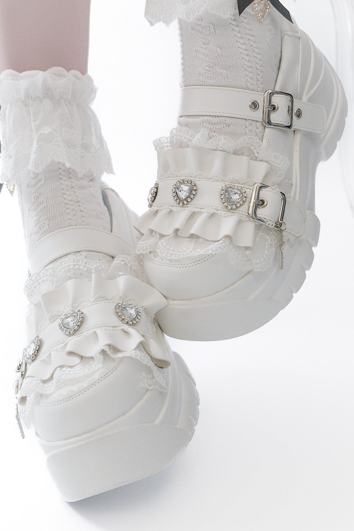 Scarpe con plateau e fibbia arricciata