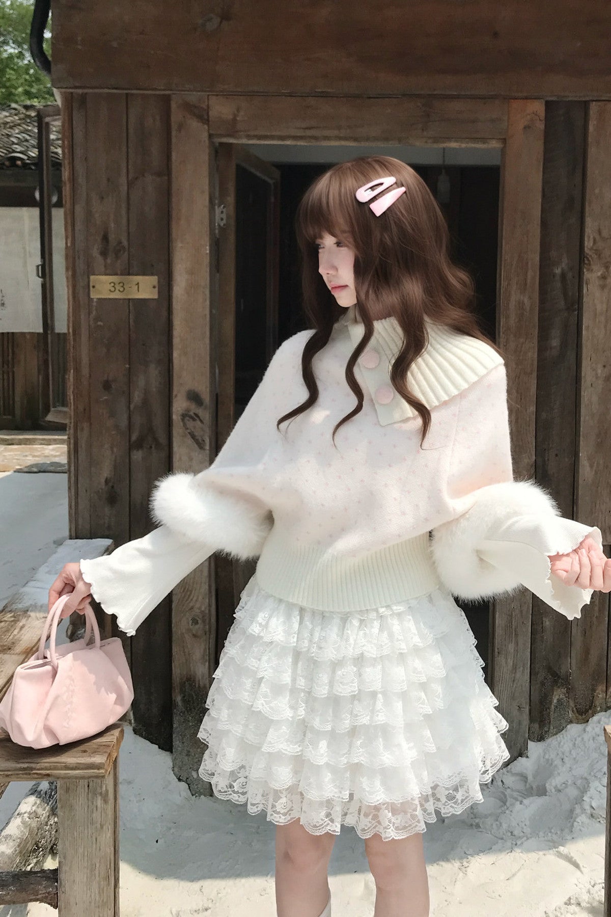 Ensemble jupe et pull cape rose en fausse fourrure