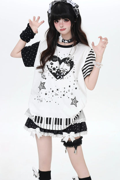 Camiseta holgada de rayas con gato y piano