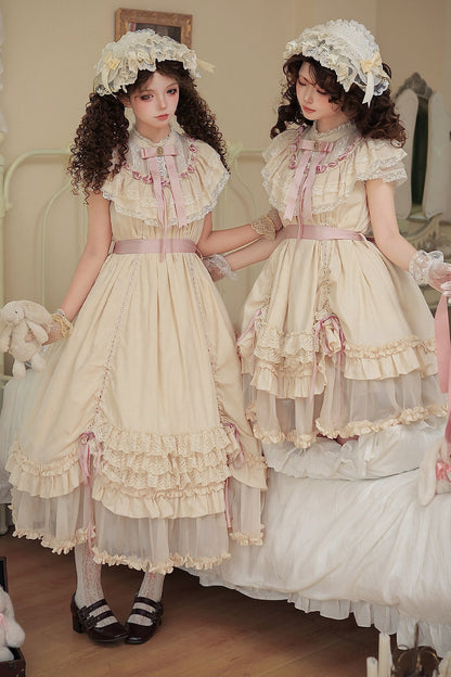 Milchtee-rosa Lolita-Kleid mit Puppen-Rüschen