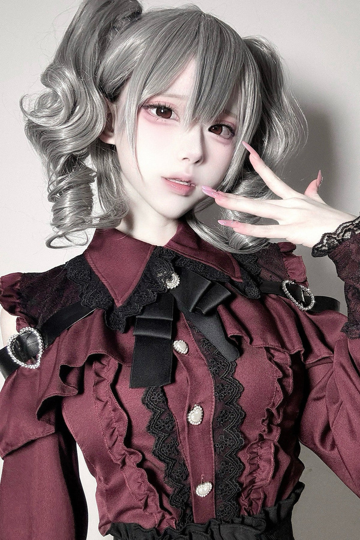 [Pre-order] Cold Shoulder Heart Buckle Long Sleeve Ruffle Lace Blouse with Bow Tie + Lace-Trim Pleated Mini Skirt Set