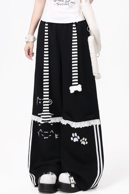 Hose mit Spitzenstickerei, Drapierung und hoher Taille