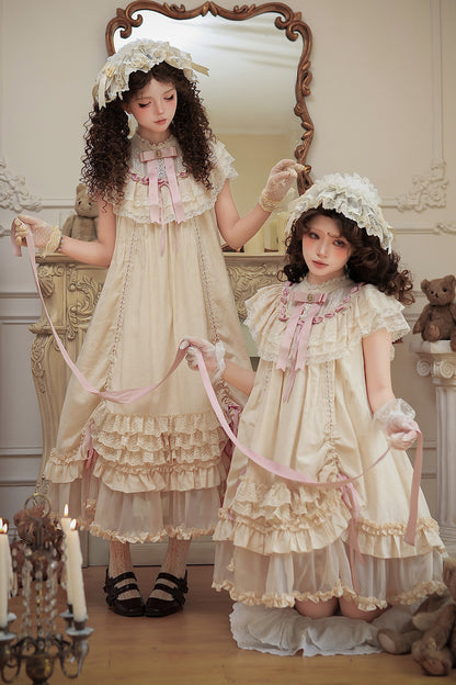 Milchtee-rosa Lolita-Kleid mit Puppen-Rüschen