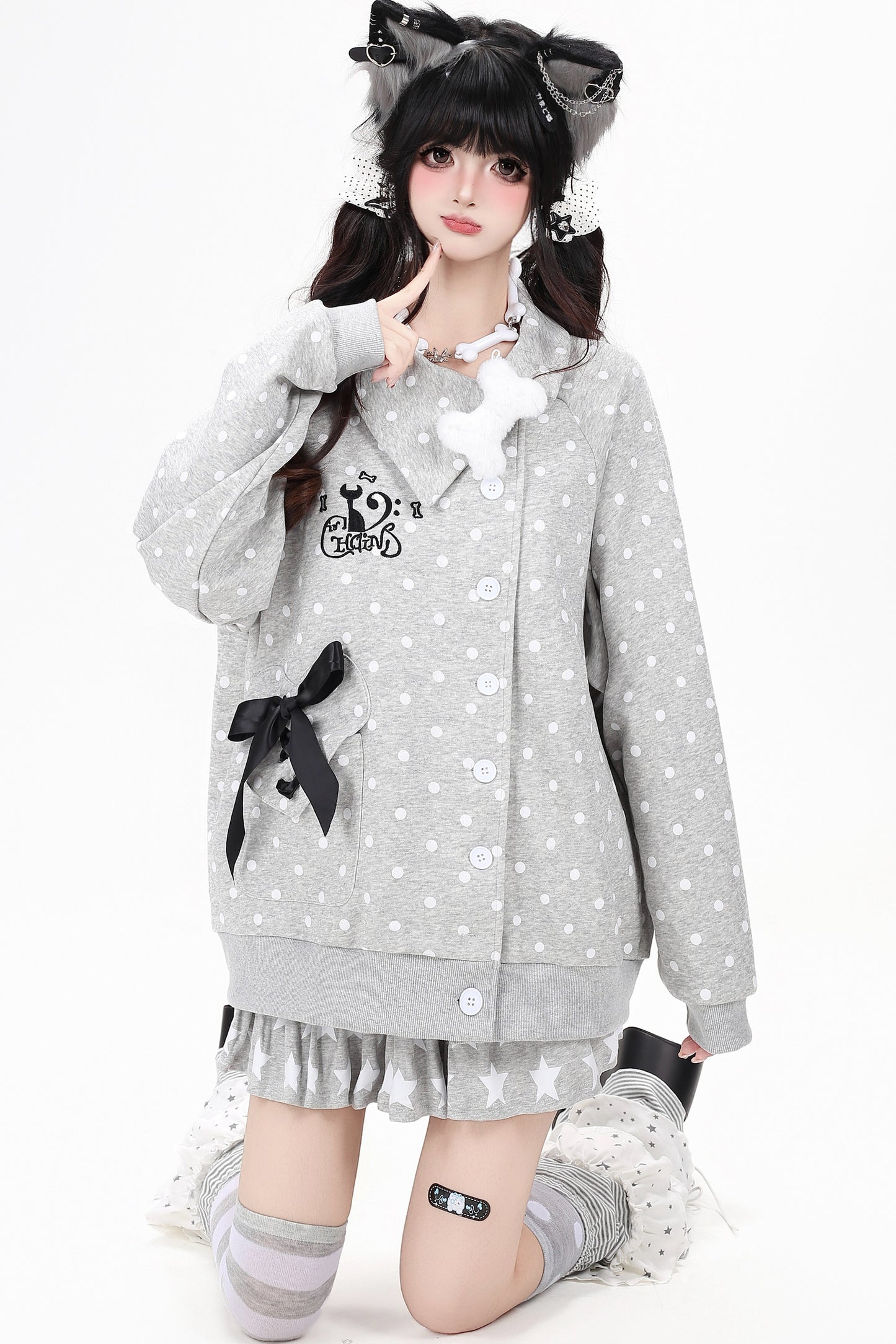 Chaqueta de lunares con gato