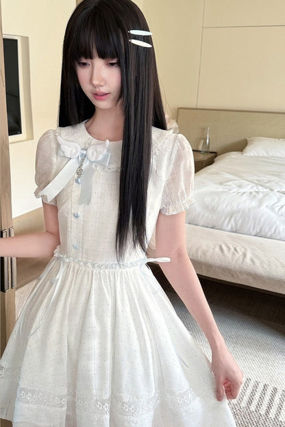 Kleid mit Polka-Dots, Musiknoten und Spitzenbesatz