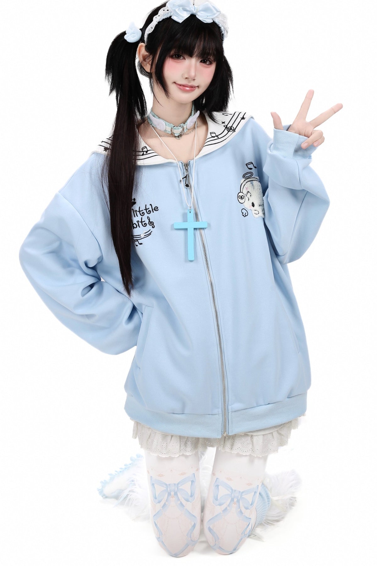 Chaqueta con cremallera y bordado de conejito estrella