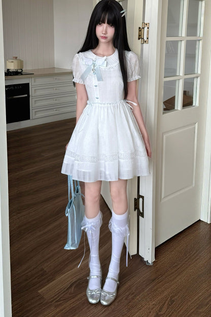 Kleid mit Polka-Dots, Musiknoten und Spitzenbesatz