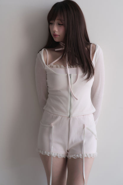 Set con top con fiocco incrociato + pantaloncini in pizzo