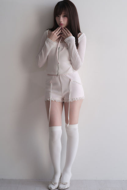 Set con top con fiocco incrociato + pantaloncini in pizzo