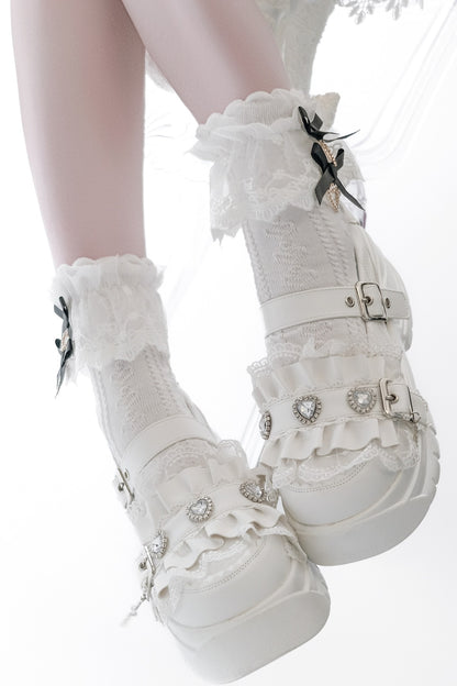 Scarpe con plateau e fibbia arricciata