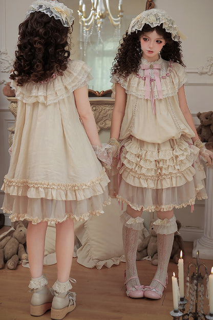 Milchtee-rosa Lolita-Kleid mit Puppen-Rüschen
