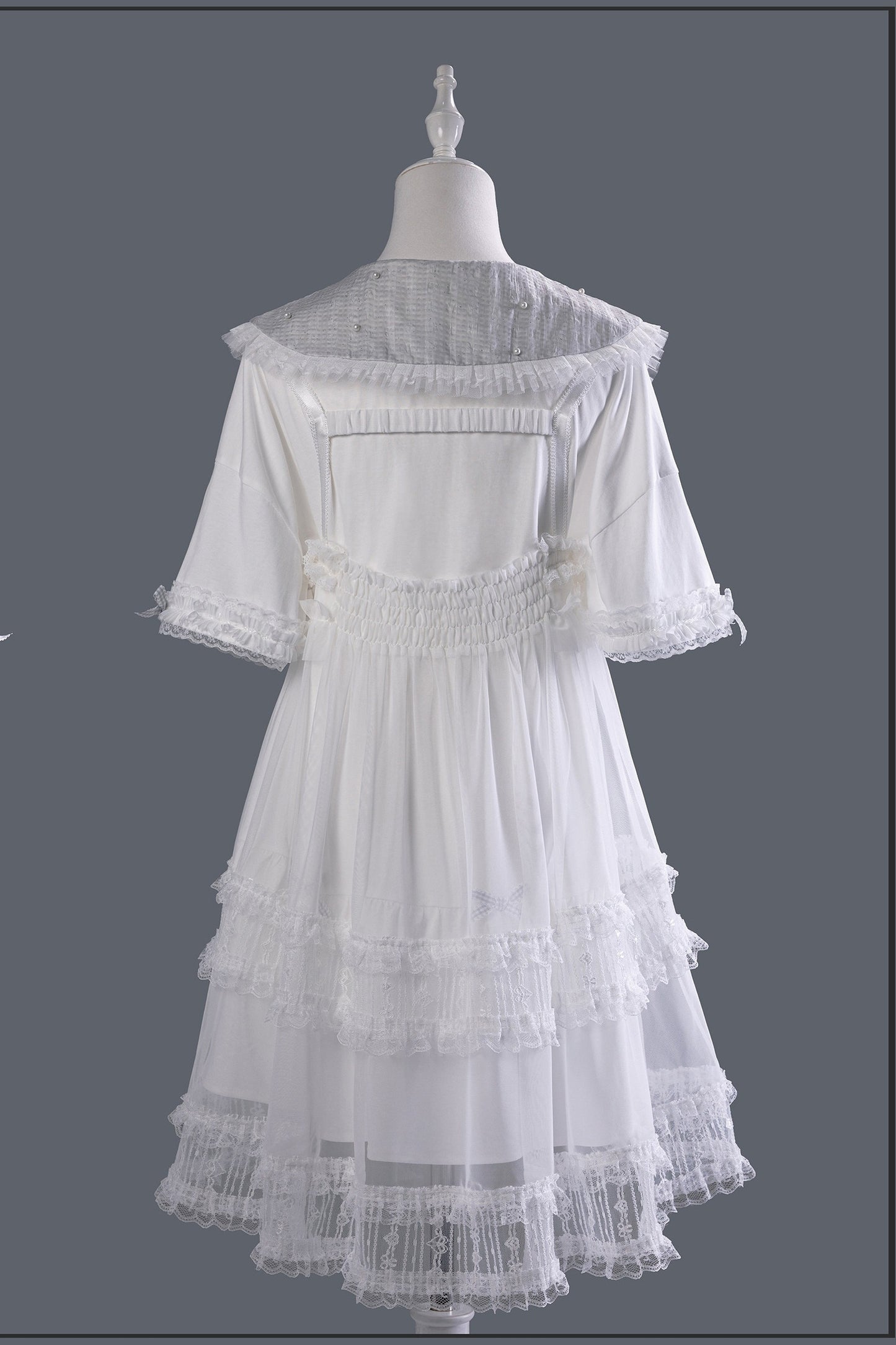 Dolly-Rüschenkleid eines schlafenden Engels