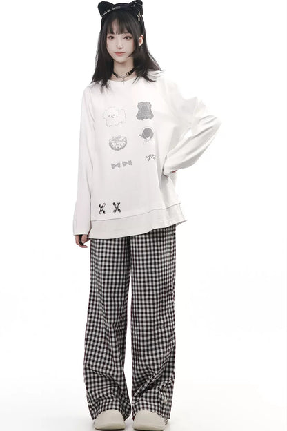 Completo top a maniche lunghe e pantaloni con stampa cucciolo e motivo scozzese