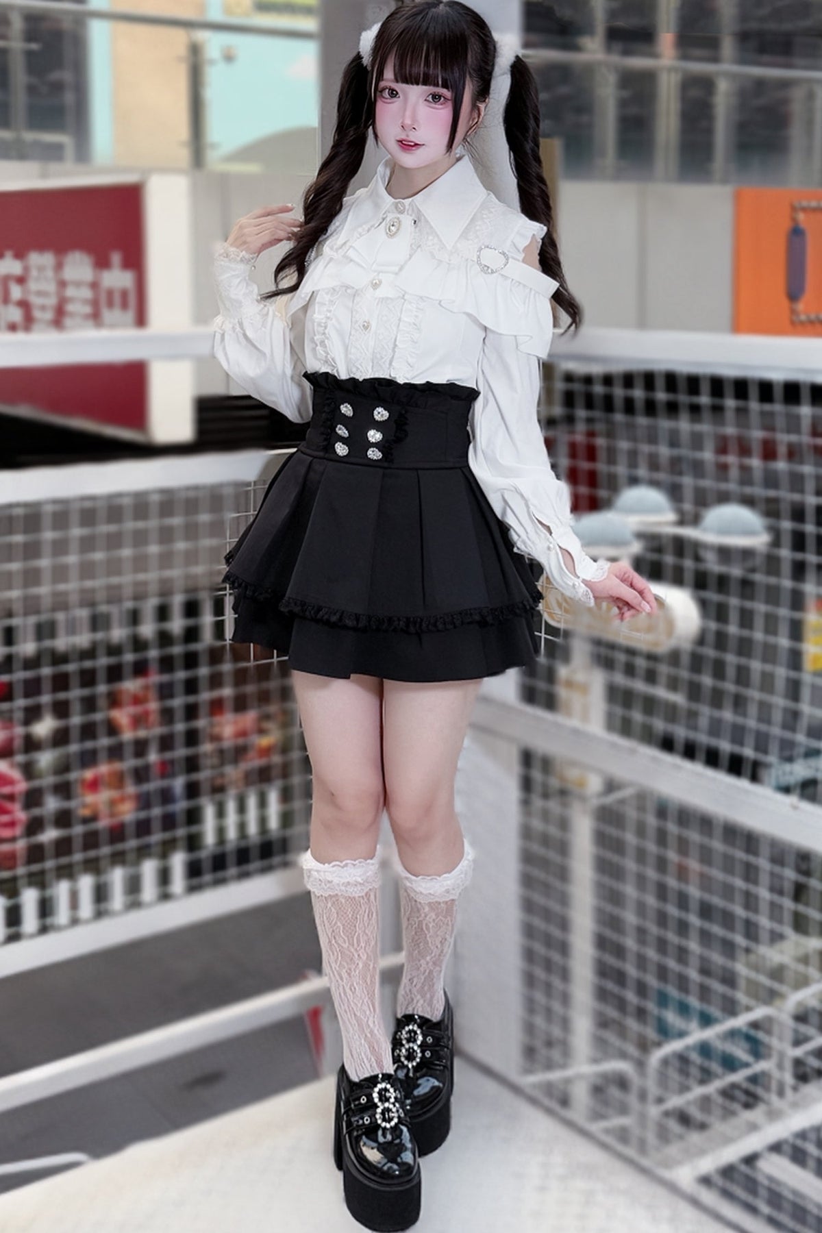 [Pre-order] Cold Shoulder Heart Buckle Long Sleeve Ruffle Lace Blouse with Bow Tie + Lace-Trim Pleated Mini Skirt Set
