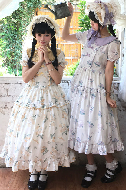 Kleid mit pastoralem Blumenprint und Bubikragen