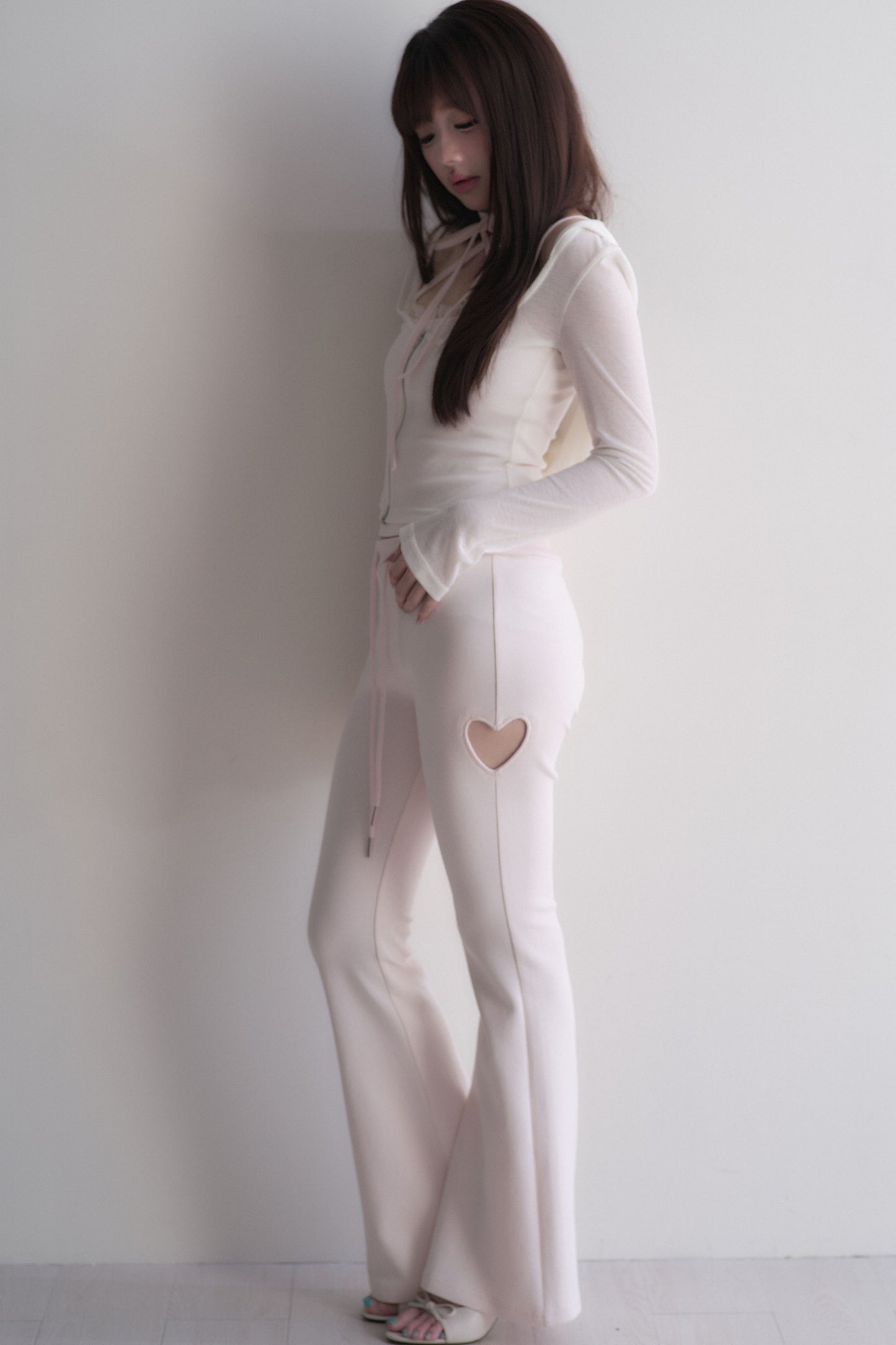 Set con top con fiocco incrociato + pantaloncini in pizzo