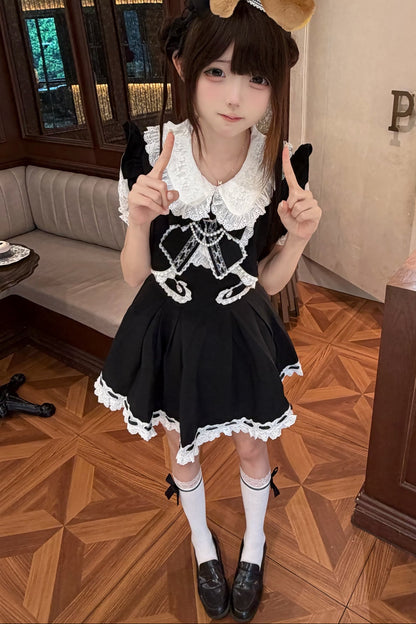 Schwarz-weißes Spitzenkleid-Set im Lagenlook