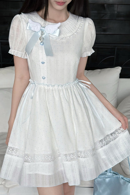 Kleid mit Polka-Dots, Musiknoten und Spitzenbesatz