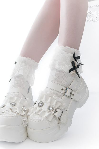 Scarpe con plateau e fibbia arricciata