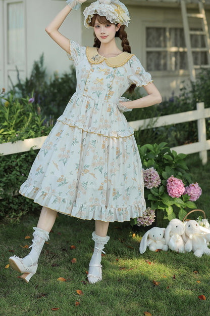 Kleid mit pastoralem Blumenprint und Bubikragen
