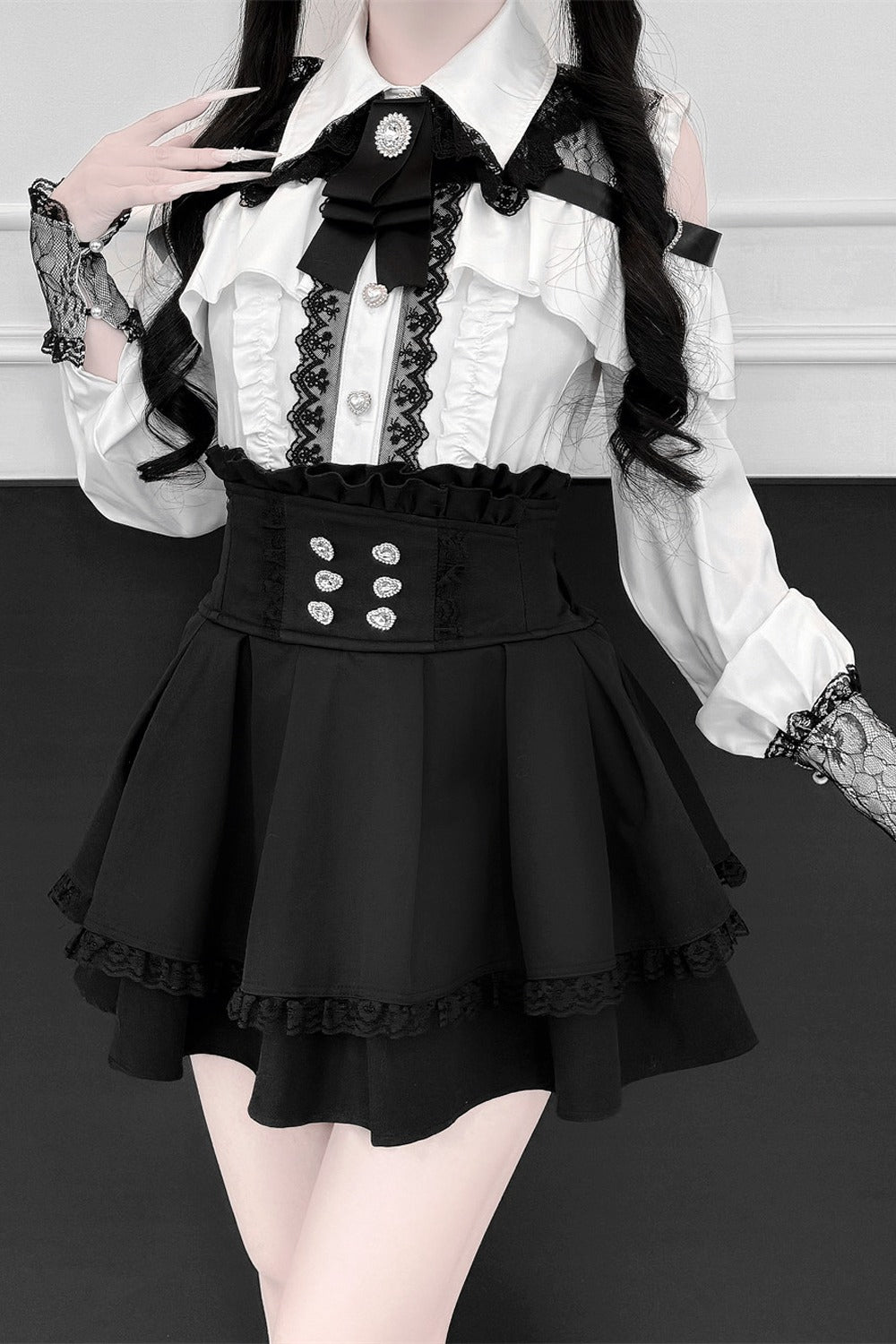 [Pre-order] Cold Shoulder Heart Buckle Long Sleeve Ruffle Lace Blouse with Bow Tie + Lace-Trim Pleated Mini Skirt Set