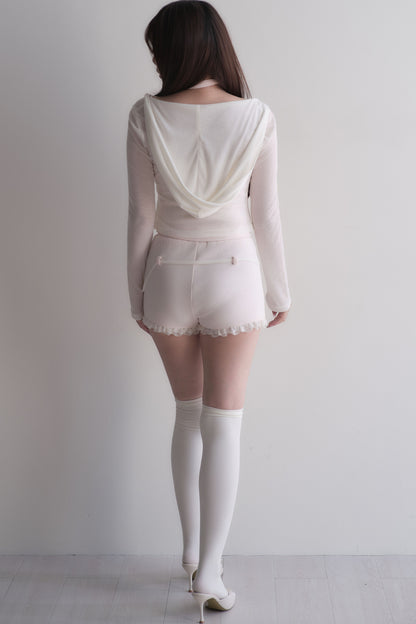 Set con top con fiocco incrociato + pantaloncini in pizzo