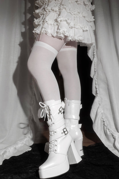 Bottes à plateforme à bout carré et brides croisées inversées
